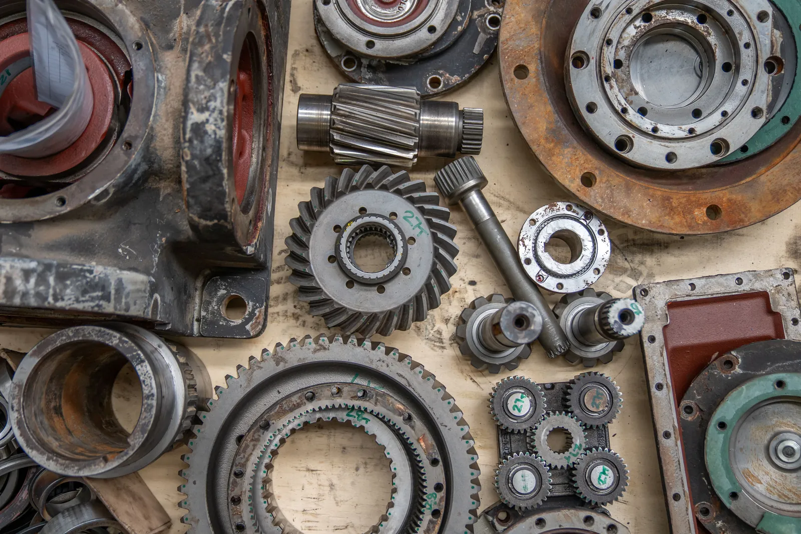 Differential and axle gears laid out on a bench